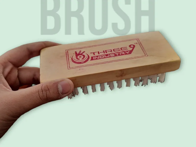 Wooden brush with a stamped brand logo