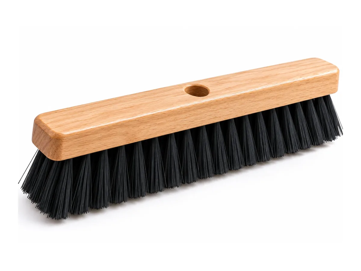 Wooden push broom with black bristles
