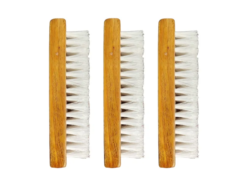 Wooden brushes with white bristles